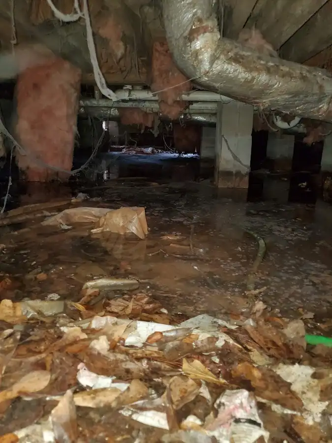 Crawl space flood assessment for Commercial Water Damage Restoration in Fitchburg